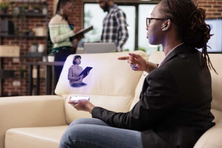 Pessoa usando a tecnologia 6g para falar com outra pessoa por holograma