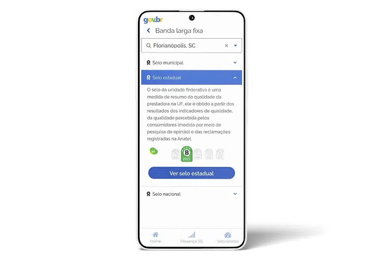 Interface do aplicativo mostrando a aba "Selo estadual" expandida. Um texto explica que a nota é uma medida resumo da qualidade na Unidade Federativa. Abaixo, vê-se o selo da operadora Oi com nota B para o ano de 2025.